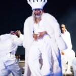 Regal in White: Ciara's Contemporary Nobility