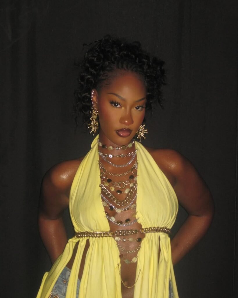 "Tems Dazzles in Yellow & Gold at 7Fest: Photos You Can't Miss!"